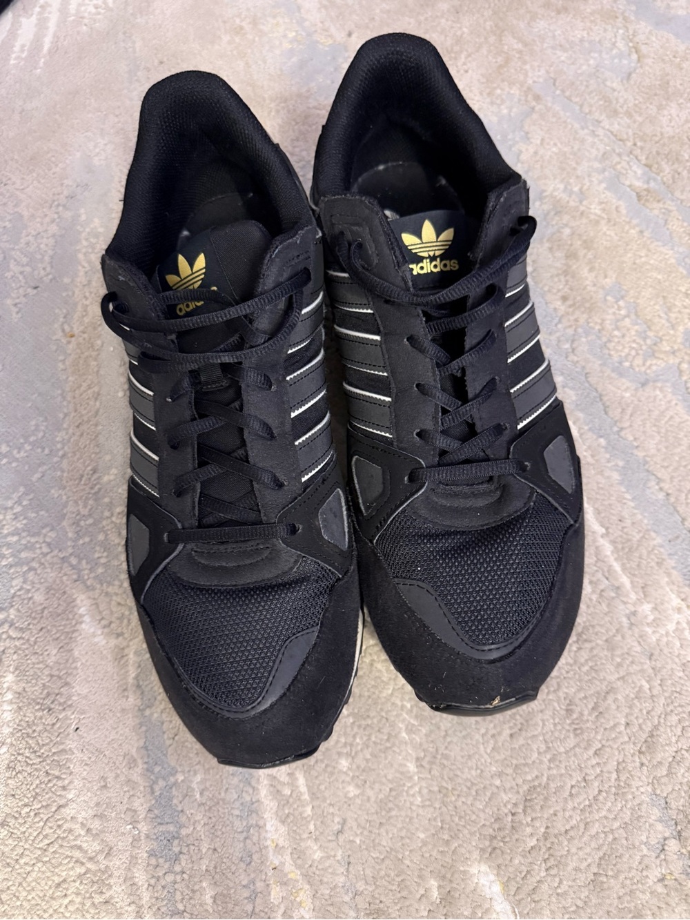 adidas Black Sneakers with White Stripes and Gold Logo